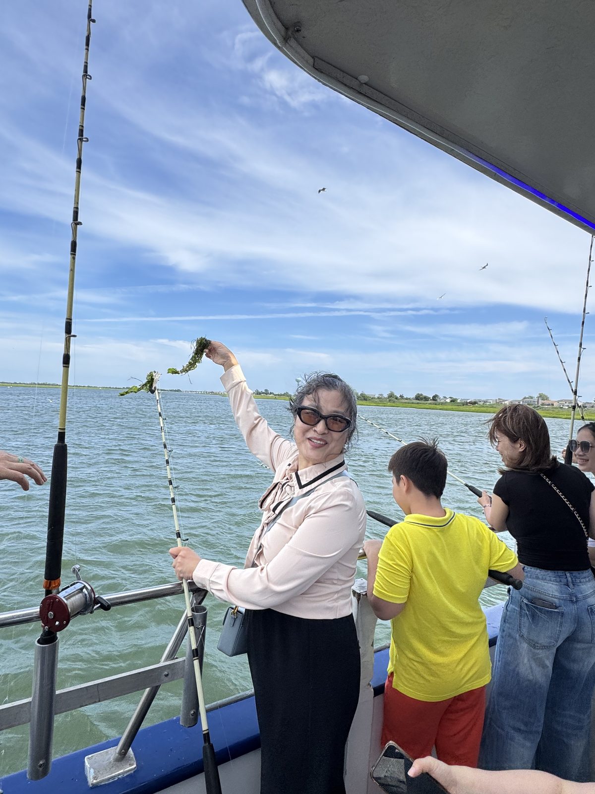 An attorney happily shows off her own catch